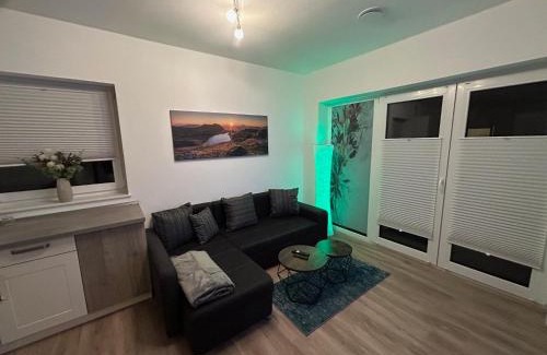 Schiffdorferdamm Apartment | Moderne Ferienwohnung Green Garden mit Garten und Stellplatz