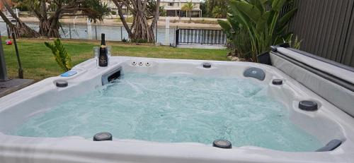 Mooloolaba House | MOOLOOLABA CANAL HOME - Modern 4Bedroom with Spa, Sauna and Private Pontoon - NEW proprietor 2024