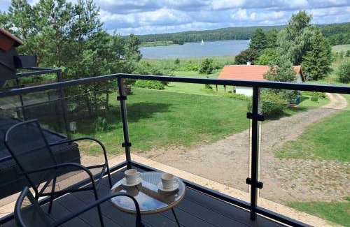 Ryn Resort | Nad Zatoką pokoje z widokiem na jezioro