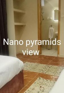 Al Haram House | Nano pyramids view
