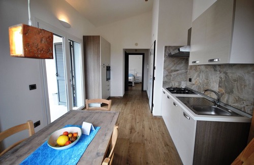 Orosei Condo | New 2-room apartment 48 m2, for 2 persons, 2nd floor incl. 16 m2 balcony