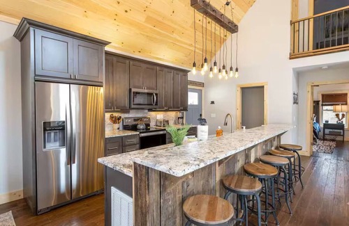 Vilas Cabin | NEW Creekside 4-BR Modern Cabin with Hot Tub, Fire Pit, Grill, 2+ Acre field!