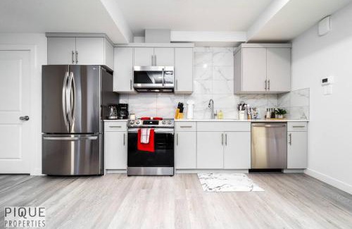 Southwest Edmonton Apartment | *NEW* Modern Suite King Bed! Netflix! Sleeps 4!