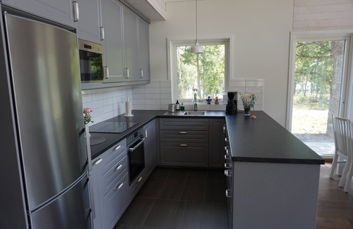 Sissehult House | Newly built modern house solely located directly by the lake with its own dock and boat