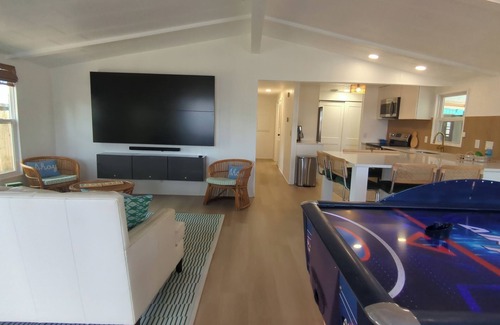 Cocoa House | Newly renovated home with air hockey, games, huge TV wall,fenced yard+screenroom