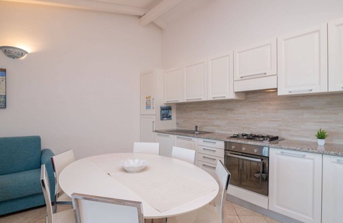 Porto Pozzo Apartment | Nice apartment for 6 guests with pool, A/C, WIFI, terrace and pets allowed