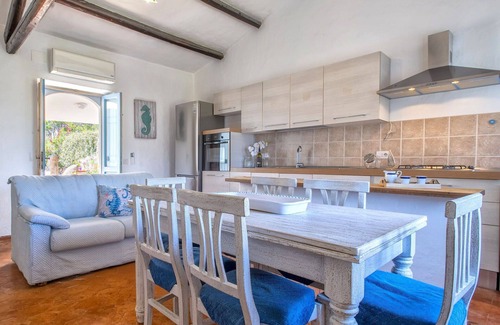 Capriccioli House | Nice apartment in villa for 5 guests with A/C, WIFI, TV, patio, pets allowed and parking