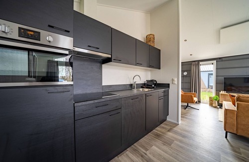 Kerkdriel Ski Chalet | Nice chalet with combi microwave, near the Maas