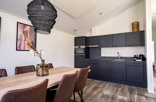 Kerkdriel Ski Chalet | Nice chalet with combi microwave, near the Maas