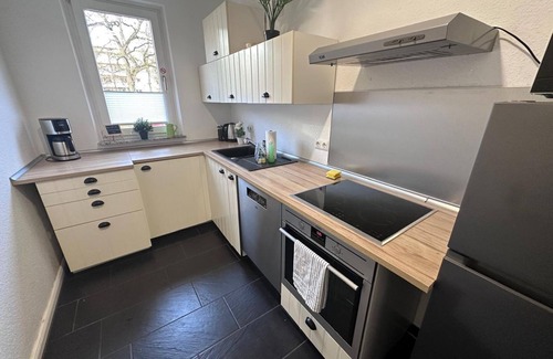 Sudstadt Apartment | NORDLICHT vacation apartment with balcony and infrared sauna - Ferienwohnung Nordlicht