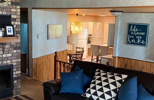 Solon Springs Cabin | Northwoods lake home with gentle slope to clear lake with sandy beach