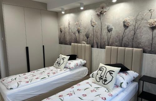 Biskupiec Apartment | Nowy apartament z dwoma sypialniami i garażem