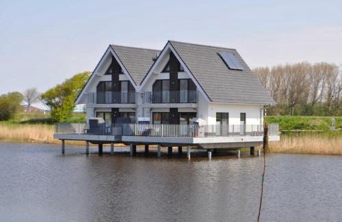 Harlesiel House | Nr 110 - Ferienhaus Seeperle Pfahlhaus auf der Harle