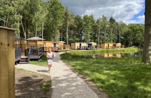 Storwood House | Oak Boutique Lodge includes hot tub air con & dog