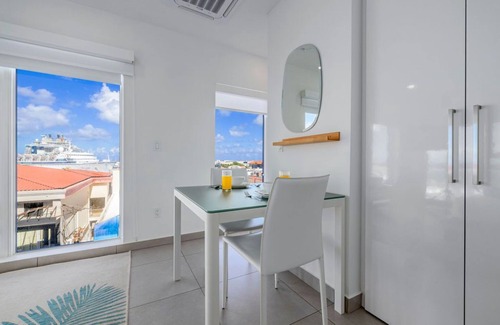 Oranjestad Condo | Ocean and City View Downtown Upscale Studio.