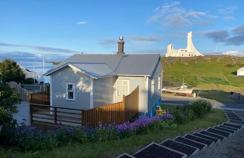 Stykkisholmur Villa | Oceanfront holiday home with outdoor hot tub.