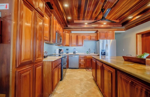 Boca Ciega Condo | Ocean’s Edge 1A – Ground-Floor Beachfront Condo on Ambergris Caye