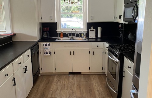 Troutman House | Old Lake Charm with Million Dollar Views