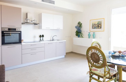 Aci Castello Apartment | On the sea of Acitrezza with a view of the Faraglioni rocks and private descent to the sea.