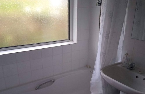 Woolacombe Ski Chalet | one bed room with sofa bed, wifi , sea views