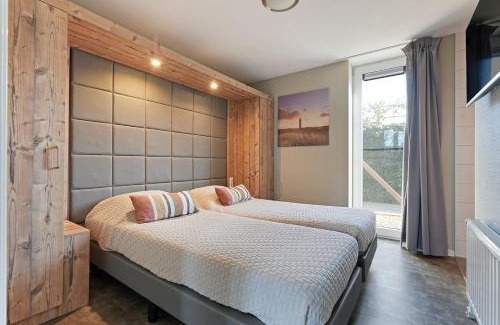 Ouddorp House | Oude Nieuwelandseweg 33A Ouddorp Villa IJsvogel met jacuzzi - NOT FOR COMPANIES