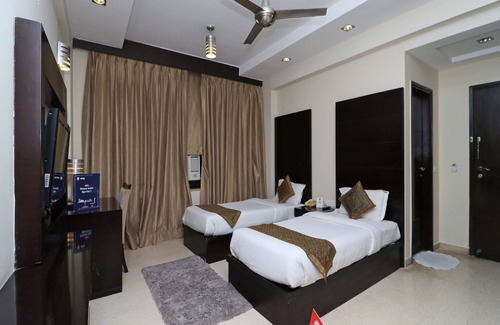Sector 31 Hotel | OYO 13783 The Claire