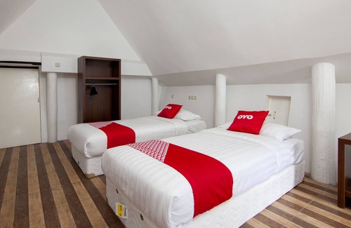 Ambarita Bed & Breakfast | OYO 1812 Dg Inn