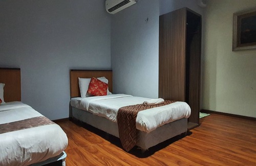 Lutong Hotel | OYO 90964 Melody 88 Inn