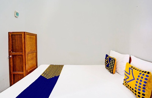Paso Hotel | OYO 94023 Kost Stan