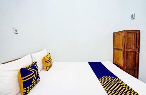 Paso Hotel | OYO 94023 Kost Stan