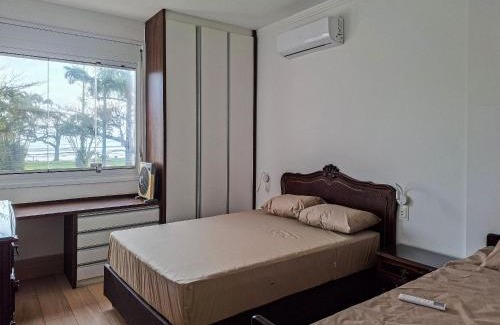 Embare Apartment | Pé na Areia em Santos: Sol, Mar e Netflix