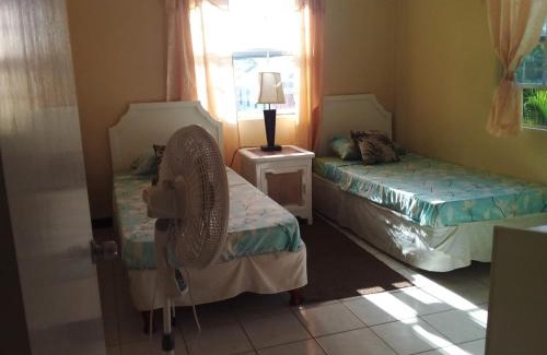 Atlantic Shores Apartment | Palm View Room 1