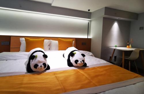 Guandu Apartment | Panda ZuoKe Besucher Apartment 熊猫坐客民宿
