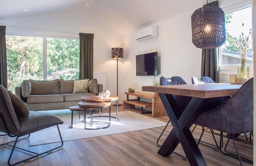 Ede Ski Chalet | ✓ Parel at Bospark Ede ✓ Holiday home for 4 people ✓ Located in Ede (Gelderland) ✓ Holiday resort in the Veluwe region ✓ Book directly at the resort