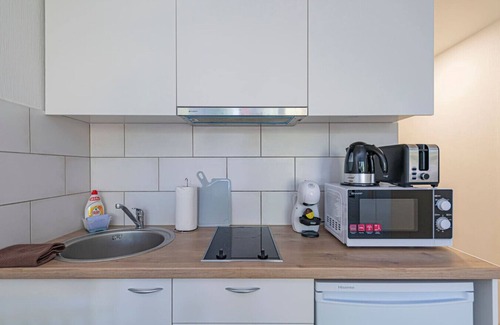 Kaunas Apartment | Partizanų studio ap 5 by Polo Apartments