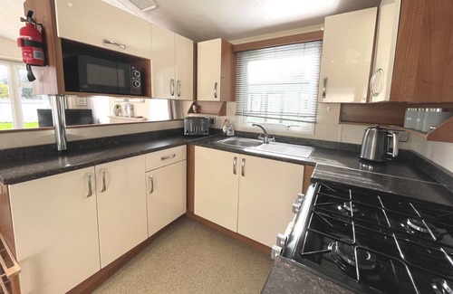 Beattock House | Pass the Keys | Charming and Cosy Holiday Home in Beautiful Park