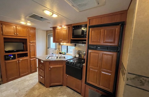 Mountain View House | Payne Lake Wilderness Huts - Camper A18n A cozy camper near a quiet lake!
