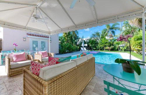 Southland Park Villa | Peaceful Pink Orchid Beach House! Huge Pool!