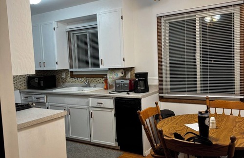 Big Rapids House | Peaceful Waterfront Living in a Cozy 2-Bedroom Duplex