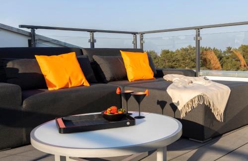 Prora Apartment | Penthouse mit Kamin, Dachterrasse, Meerblick, Gasgrill, Klimaanlage, Luxus-Design-Apartment, 2 Minuten zum Strand