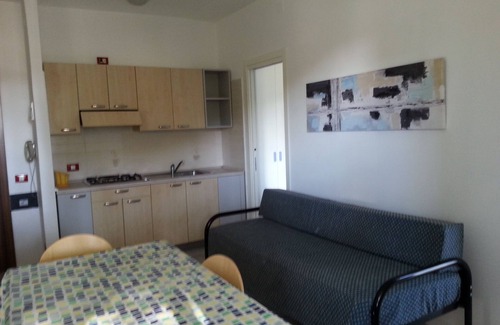 Eraclea Mare Apartment | Pine forest front apartment with swimming pool max 5 people wi-fi