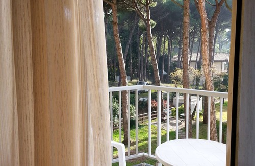 Eraclea Mare Apartment | Pine forest front apartment with swimming pool max 5 people wi-fi
