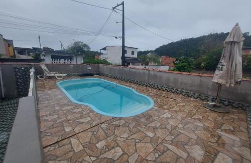 Pereque House | Piscina e mar