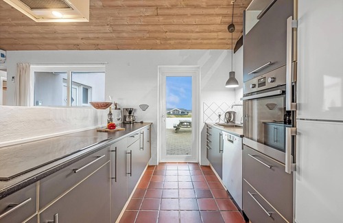 Lild Strand House | Pool and activity house with a 180-degree view of the North Sea, located at.