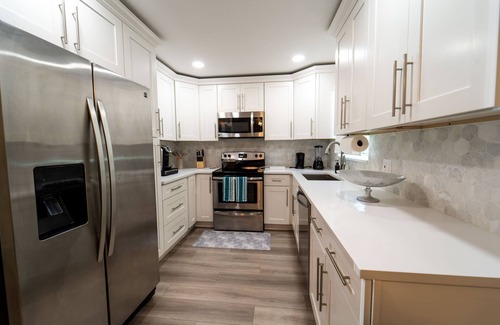 Lake Worth Corridor House | Poolside Paradise Luxury home Mins from the beach