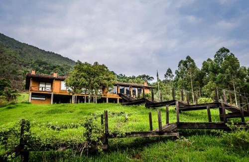 Passa Vinte House | Pousada Caminho dos Ipês