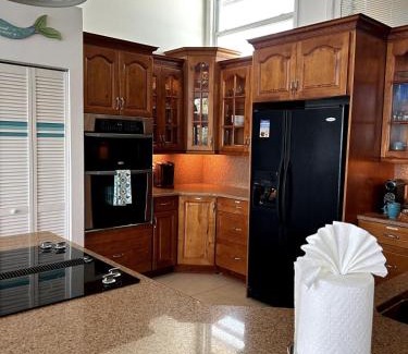 Englewood House | Private Bayfront Beach House with Dock, Steps to Beach and Restaurants