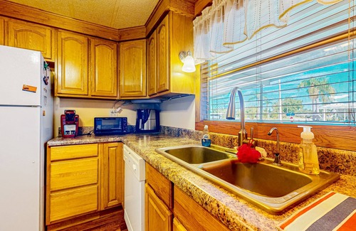 Ellenton House | Private community home with on-site pool, screened patio, central AC, & W/D