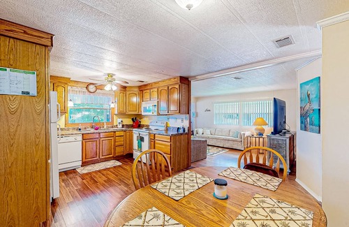 Ellenton House | Private community home with on-site pool, screened patio, central AC, & W/D