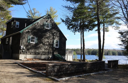 Middleton House | Private Peninsula, 600’ Of Waterfront + Sandy Beach on Sunrise Lake